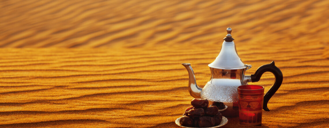 arab teapot cup dates stand sand desert