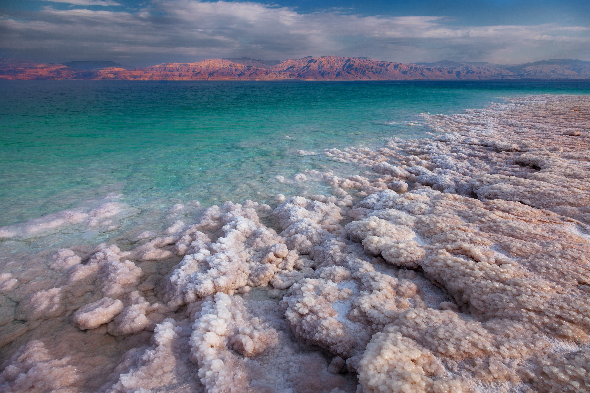 view dead sea coastline salt crystals