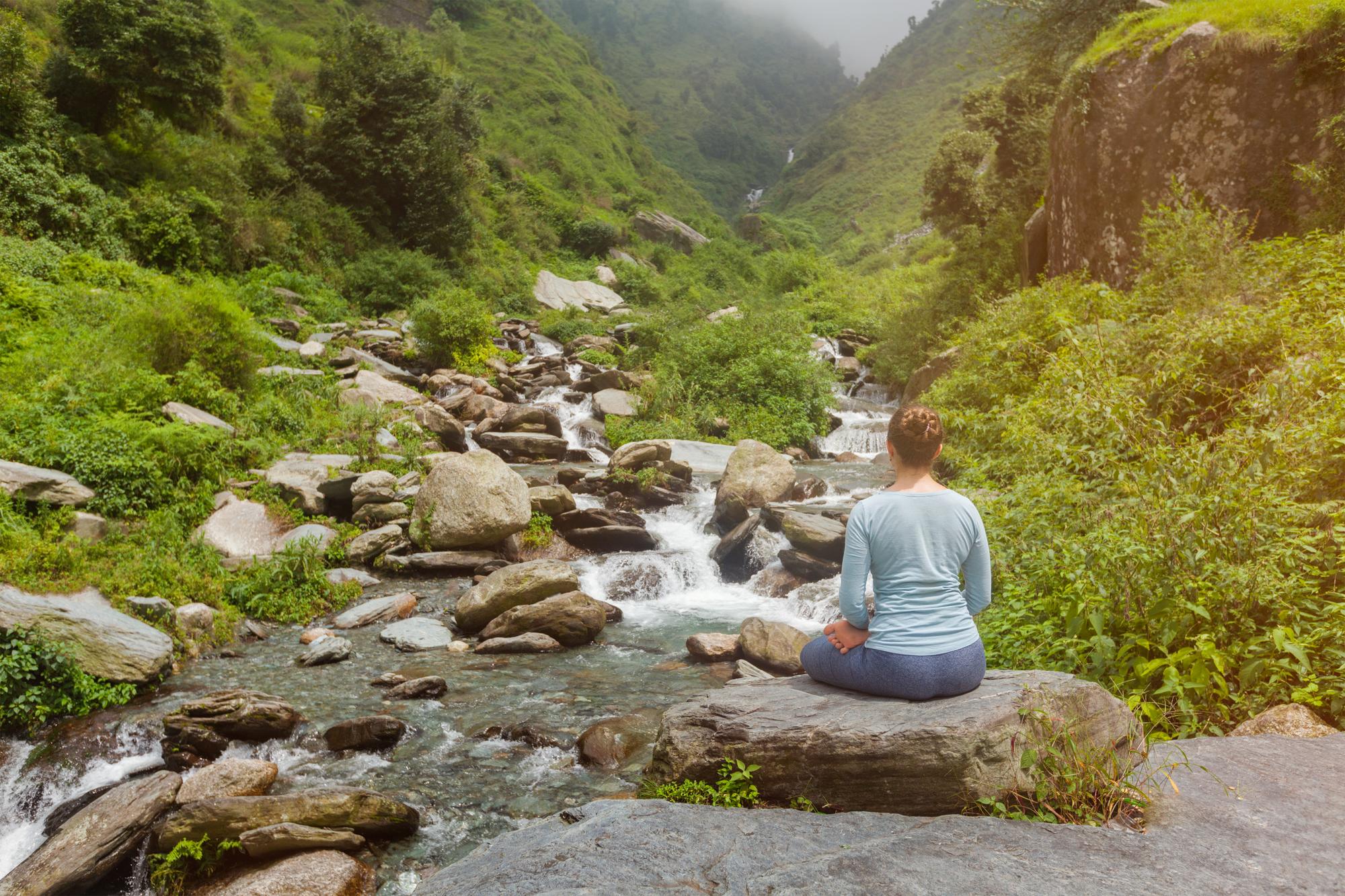 woman-padmasana-outdoors