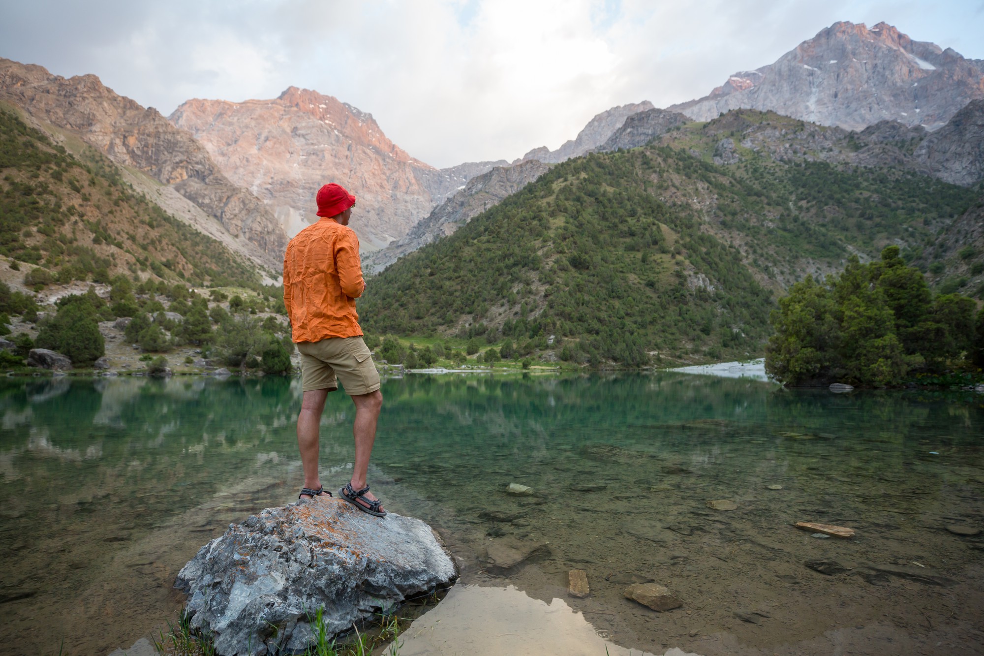 man-hiking-beautiful-mountains