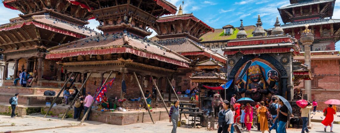 group-people-temple-outside-building