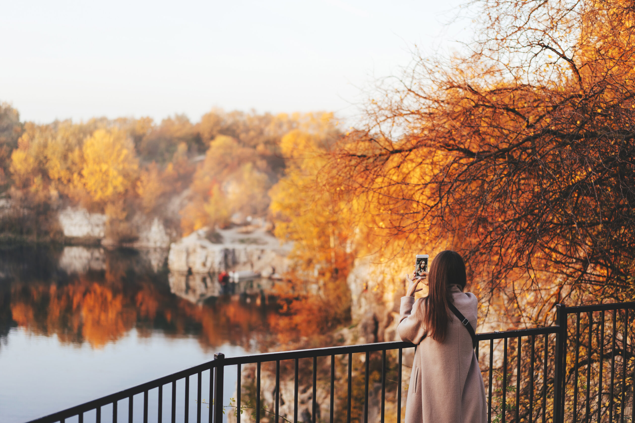 Scenic autumn view of European city with colorful foliage